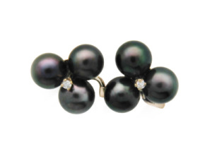 Black pearl and diamond cluster earrings in yellow gold.