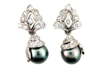 Black pearl and pavé set diamond earrings in white gold.