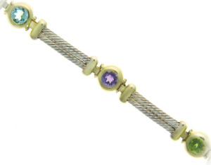 Multi-gemstone bracelet with blue topaz, amethyst and peridot.