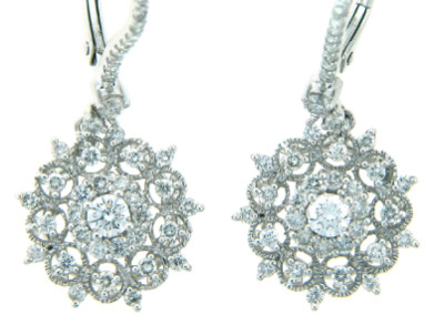 Pavé set diamond dangle earrings in white gold.
