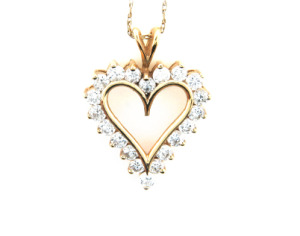 Diamond heart pendant in yellow gold.
