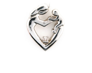 Diamond mother and child pendant in white gold.