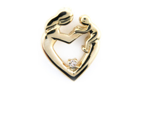 Diamond mother and child pendant in yellow gold.