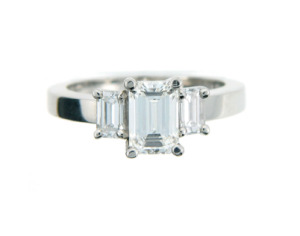 Emerald cut diamond engagement ring in white gold.