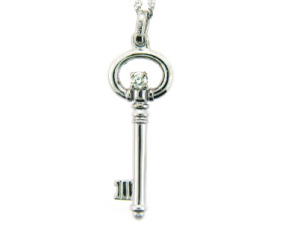 Diamond key pendant.