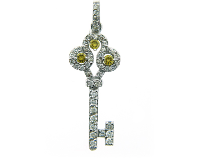 Key pendant with white diamonds and canary diamonds.