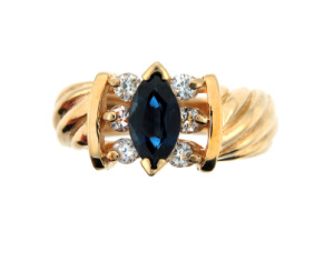 Marquis cut sapphire ring in yellow gold.
