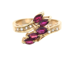 Marquise diamond and ruby ring in yellow gold.
