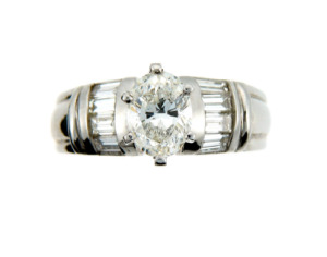 Oval diamond engagement ring in platinum.