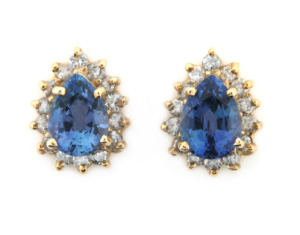 Pear cut sapphire and diamond earrings in yellow gold.