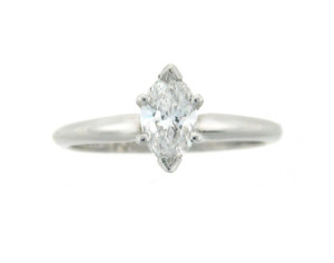 Solitaire marquis diamond engagement ring in white gold.