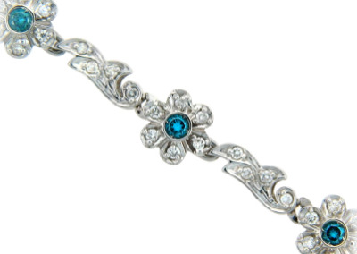 White and blue diamond bracelet in white gold.