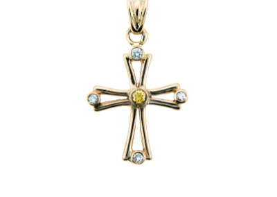 Citrine and diamond cross in yellow gold.