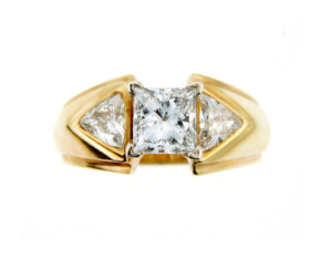 Yellow gold princess cut diamond engagement ring in white gold.