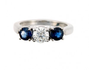 brilliant_cut_diamond_engagement_ring_with_sapphire_side_stones